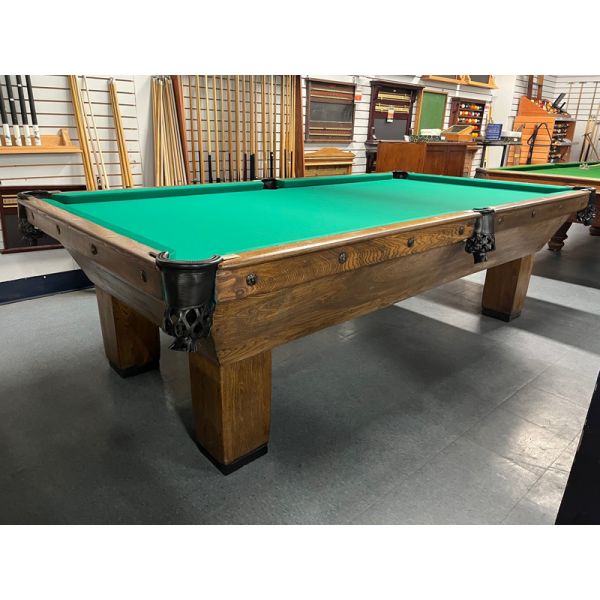 9 foot antique pool table Circa 1900's. made of solid hardwood and 1 inch thick natural quarried slate. This rare and beautiful model includes a used billiard accessory kit