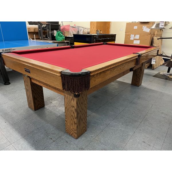 Used Palason Billiards Pioneer 8 foot pool table with 1 inch thick slate and square legs Code: TABLE378PAL8P. Made of solid hardwood, genuine leather pockets with fringes. Includes a one year warranty, a Championship Invitational burgundy cloth and a used