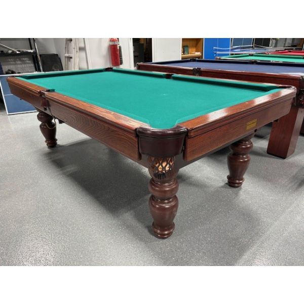 Palason Billiards Mont-Royal model used 8 foot pool table with 1 inch thick natural quarried slate Code : TABLE492PAL8P
Made in Canada with 1 inch thick slate, Mahogany finish hardwood rails and turned legs, engineered wood frame and Green billiard cloth