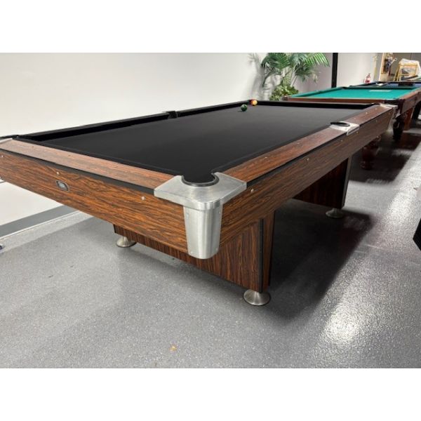 Used OBS Ontario Billiard Supply oversized 8 foot pool table with 1 inch thick slate and pedestal style legs Code: TABLE516OBS8OSP
Made of engineered woods with Arborite/Melamine Rosewood look durable outer laminate and inset pockets. 
Includes a one ye