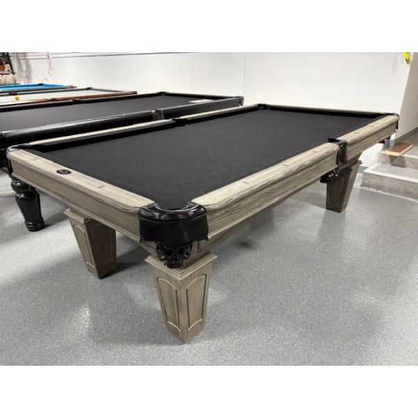 Majestic Pioneer 8 foot used pool table with 1 inch thick natural slate Code : TABLE522MAJ8P
Made with 1 inch thick slate, North American and European hardwood with Grey Barnwood finish, leather pockets and Black billiard cloth.  
