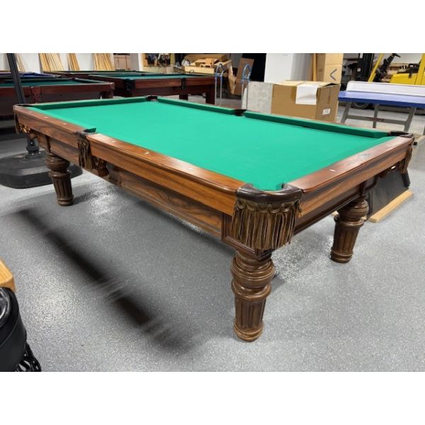 Brunswick Billiards solid hardwood used 8 foot pool table with natural slate and turned legs Code : TABLE538BRU8P
Made with Solid Hardwood with Walnut finish, genuine leather pockets with fringes and brand new Andy 600T Club stain protected billiard pro