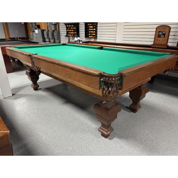 Antique Brunswick Balke Billiards Co. 8 foot natural quarried 1 inch slate used pool table Code: TABLE544BRU8P
Made with hardwood, an incredible amount of detailed wood inlay marquetry work on the 4 panels around the table, genuine leather pockets and br