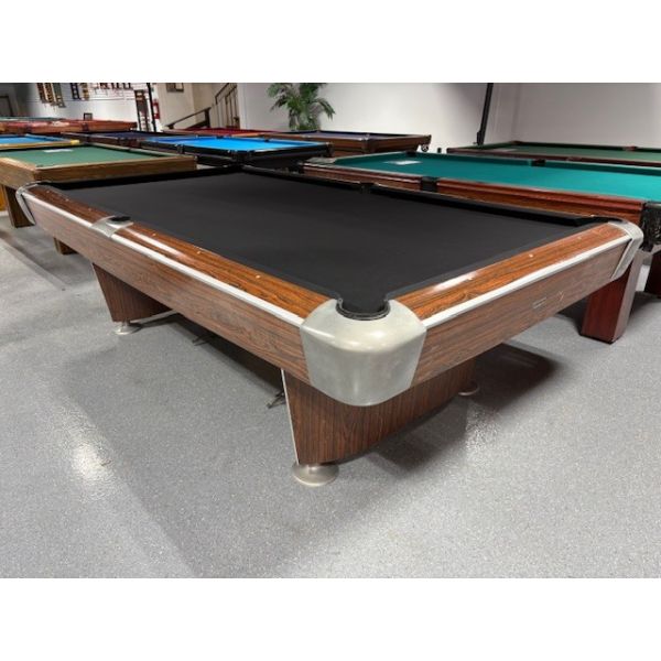 Used World of Billiard 9 foot pool table with Professional quality Andy 600T Club fast cloth Code : TABLE547WOB9P
Made with engineered woods and highly resistant Formica simulated Walnut wood finish, inset pockets, natural quarried one inch thick slate a
