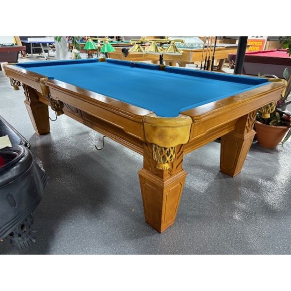 Medium Oak finish 8 foot natural quarried 1 inch slate used pool table with carved wood relief accents Code: TABLE548NN8
Made with hardwood, genuine leather pockets and brand new Simonis Blue professional competition style fast Blue cloth.