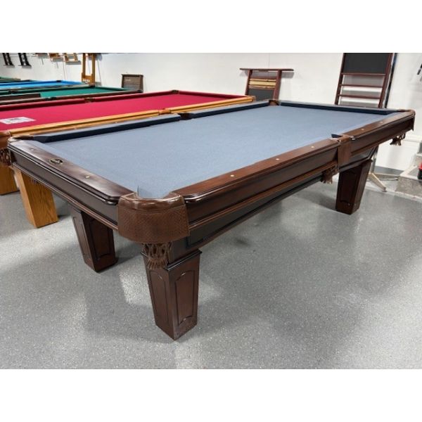 Used 8 foot Majestic Walnut Pool Table with natural quarried slate and genuine leather pockets Code : TABLE577MAJ8P
Made with European and North American Solid Hardwoods, natural quarried slate, genuine leather pockets and a Blue billiard felt cloth fabr