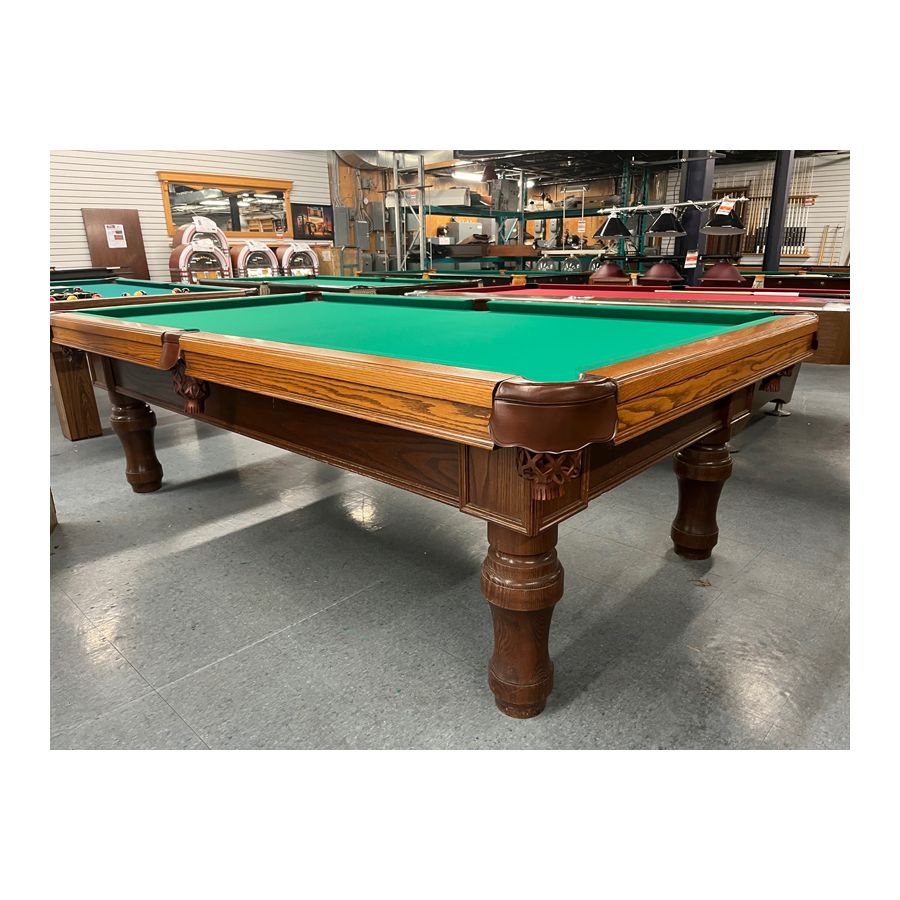 Used 9 foot Beringer Billiard brand Walnut finish Oak pool table with
