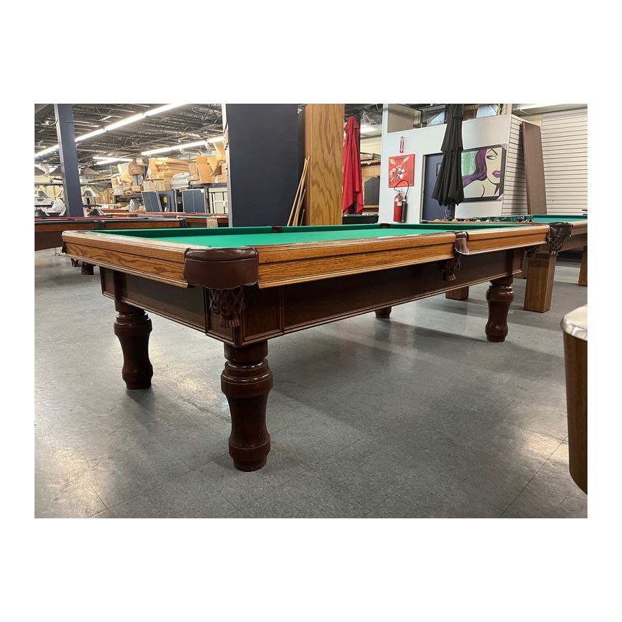 Used 9 foot Beringer Billiard brand Walnut finish Oak pool table with