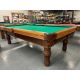 Used 9 foot Beringer Billiard brand Walnut finish Oak pool table with real slate and brand new genuine leather pockets.  It's aged and well-weathered condition give it a nice industrial appeal that would lend-itself well to any mancave or loft. Includes a