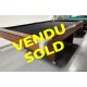 Used OBS Ontario Billiard Supply oversized 8 foot pool table with 1 inch thick slate and pedestal style legs Code: TABLE516OBS8OSP
Made of engineered woods with Arborite/Melamine Rosewood look durable outer laminate and inset pockets. 