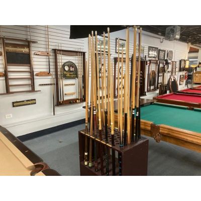 Wide assortment of used billiard cues, snooker, pool cues, racks, triangles and more at various prices